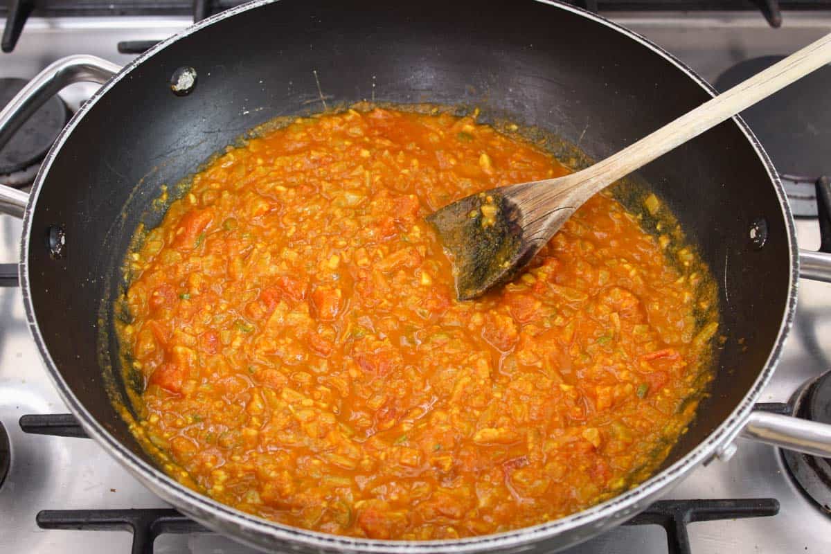 Recipe Process Shot – Adding Tomatoes to Pan