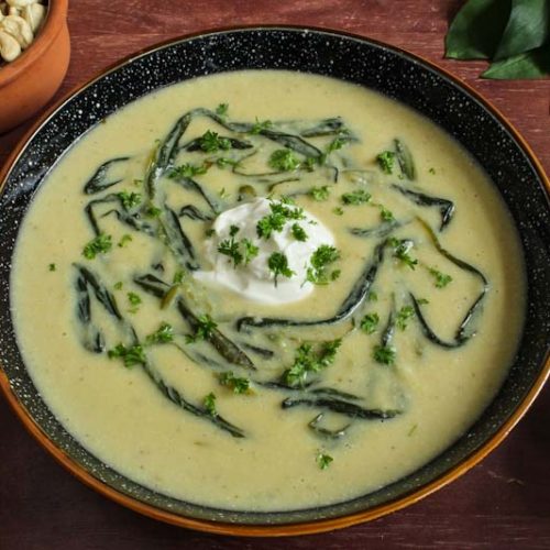 Vegan Cauliflower Cheese Soup Served in Bowl