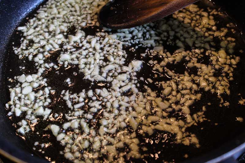 Chopped Garlic Frying in Pan
