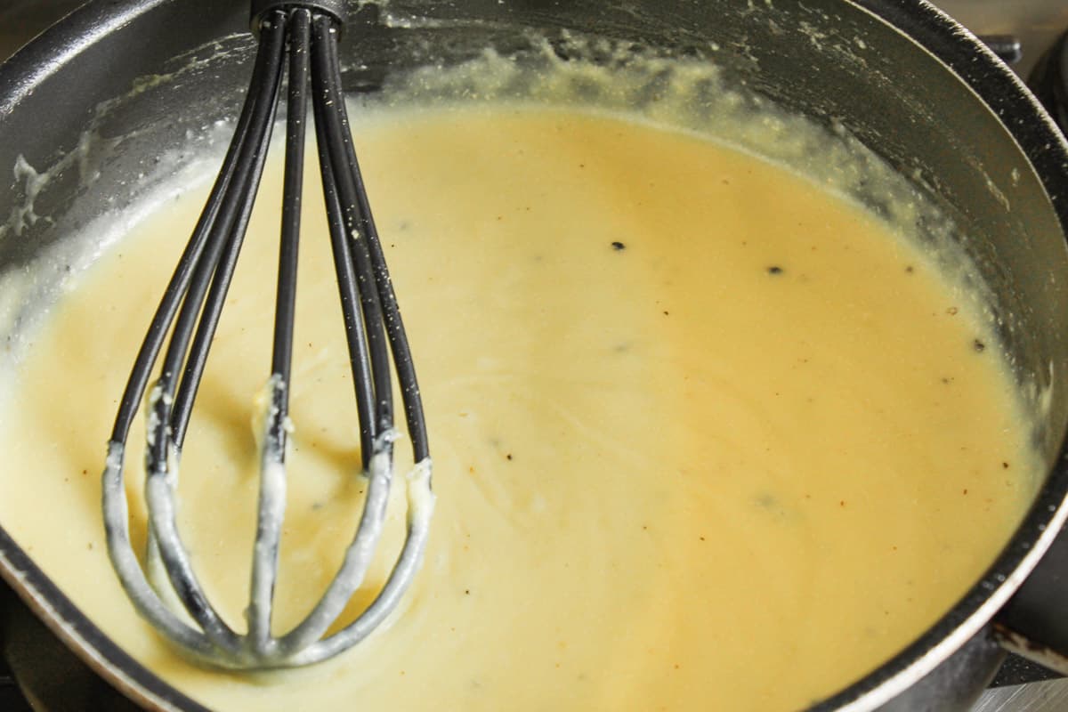 Recipe Process Shot – Whisking Dairy-Free Cheese Sauce in Pan