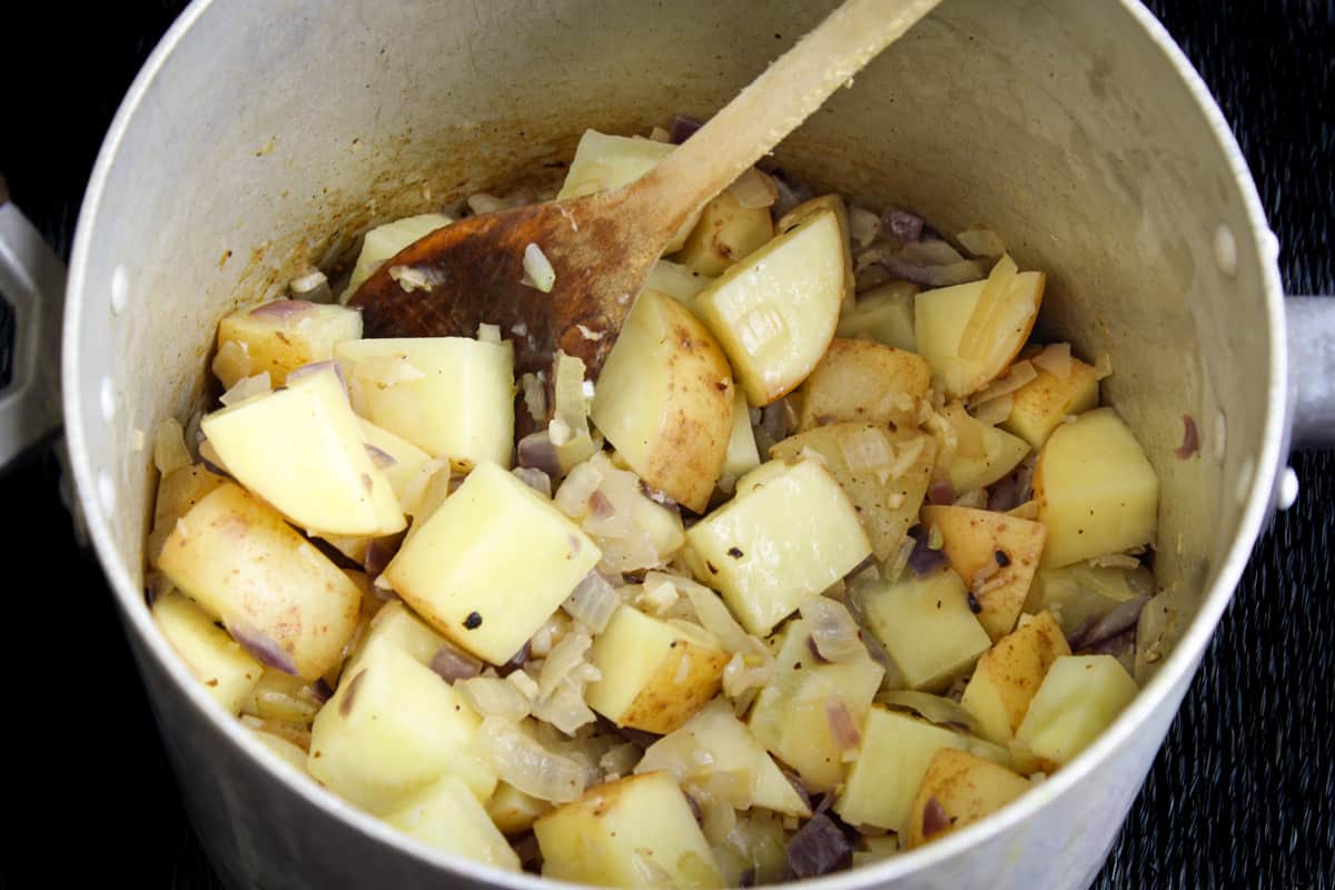 Potatoes Cooking with Onion and Garlic