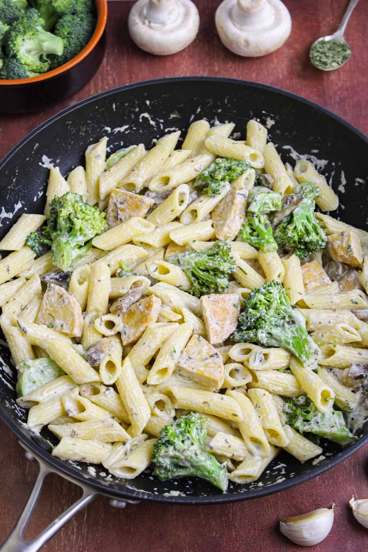 Pan of Vegan Pasta Mixed with Tempeh and Creamy Tarragon Sauce