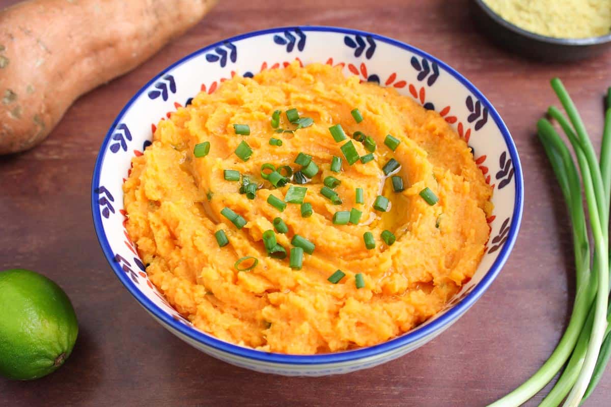 Sweet Potato Mash in Bowl with Spring Onion