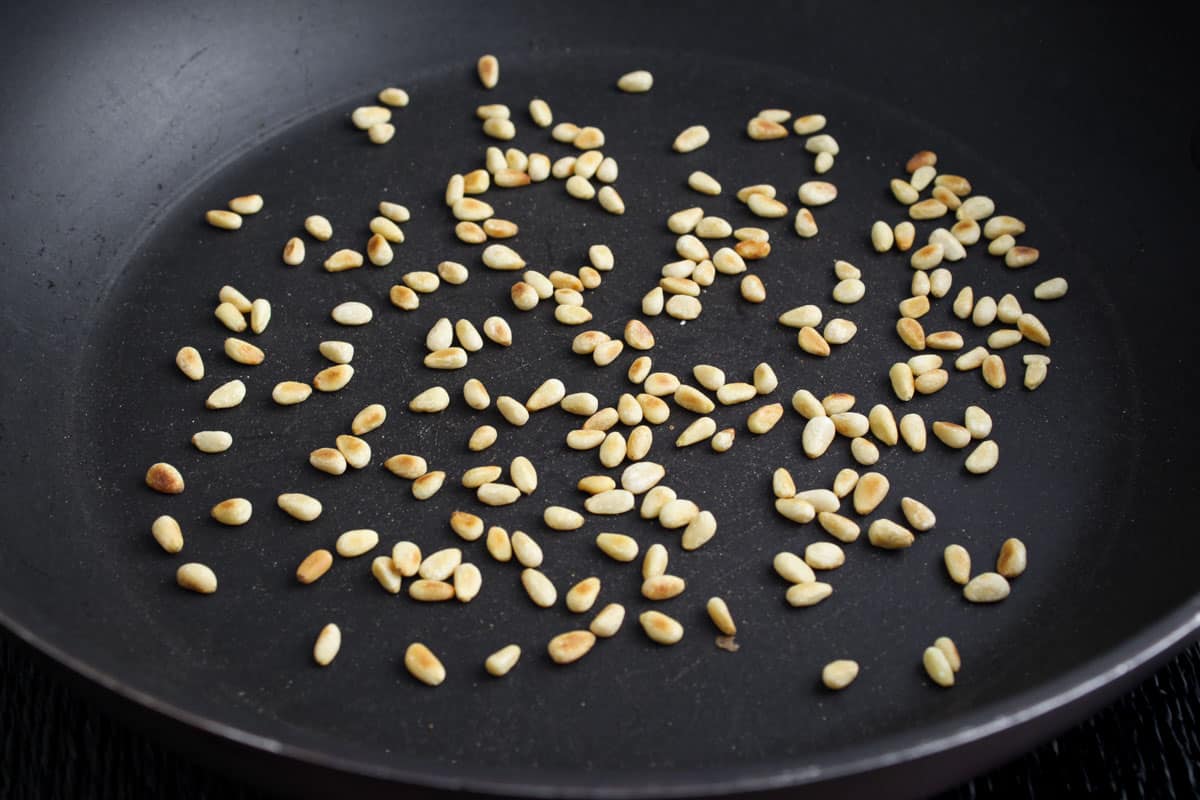 Process Shot - Pine Nuts Toasting in Pan