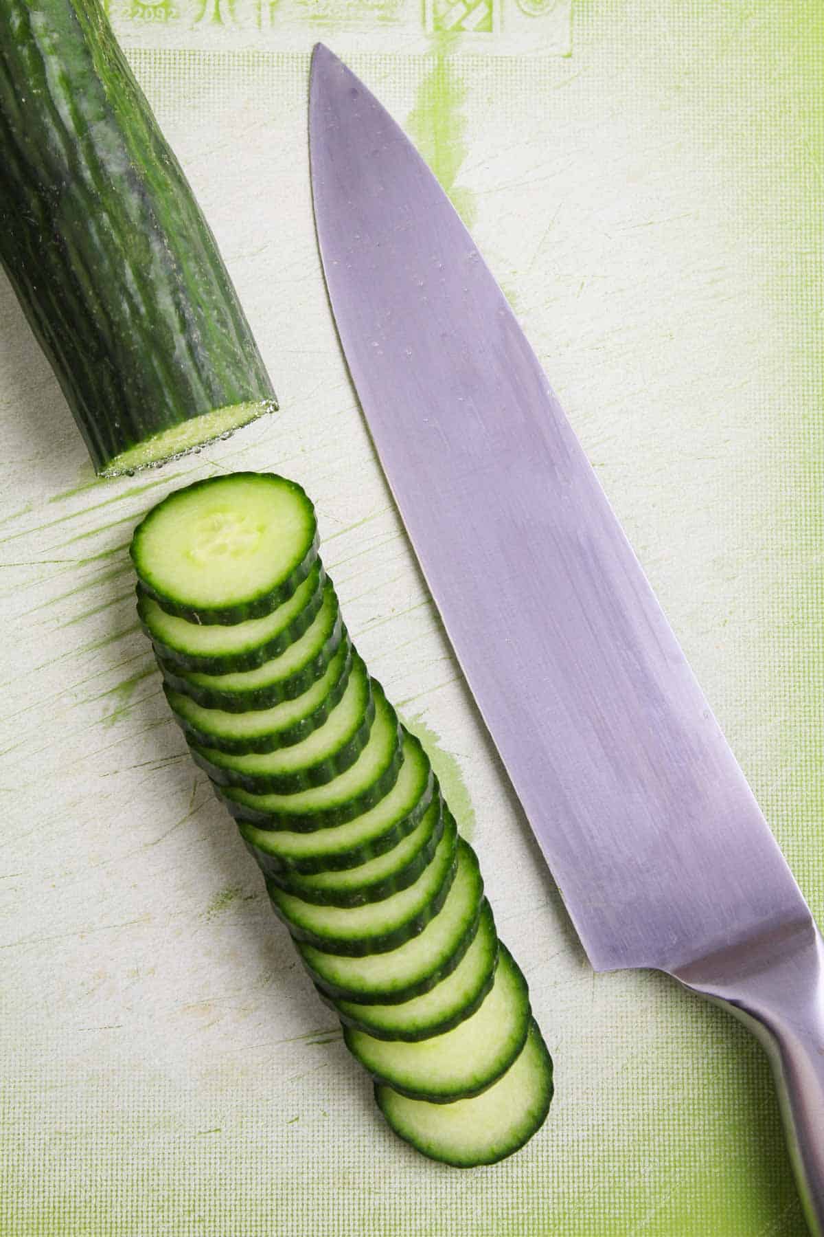 Recipe Process Shot - Slicing Cucumber on Chopping Board