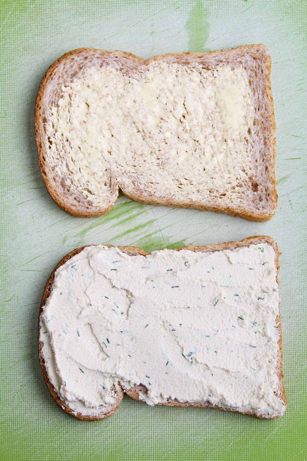 Recipe Process Shot - Buttering Bread and Spreading Vegan Cream Cheese