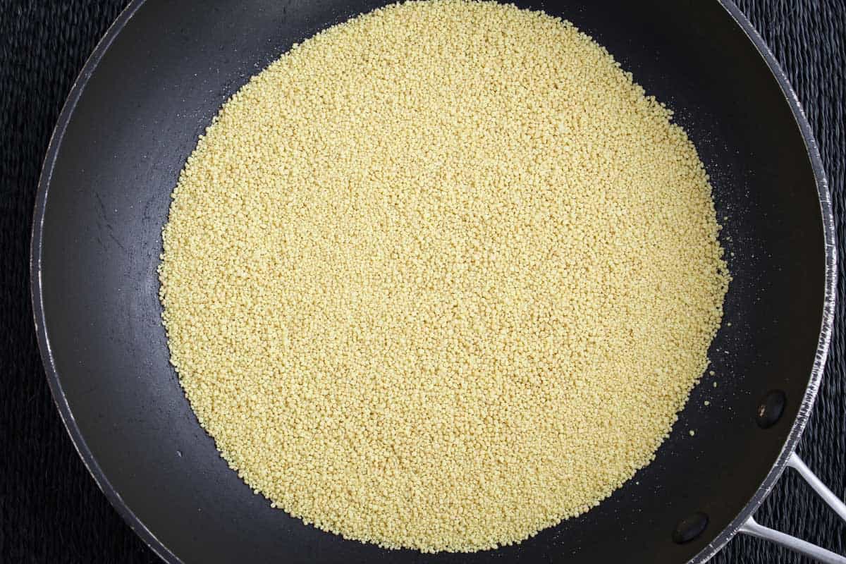 Recipe Process Shot - Toasting Couscous in Dry Pan