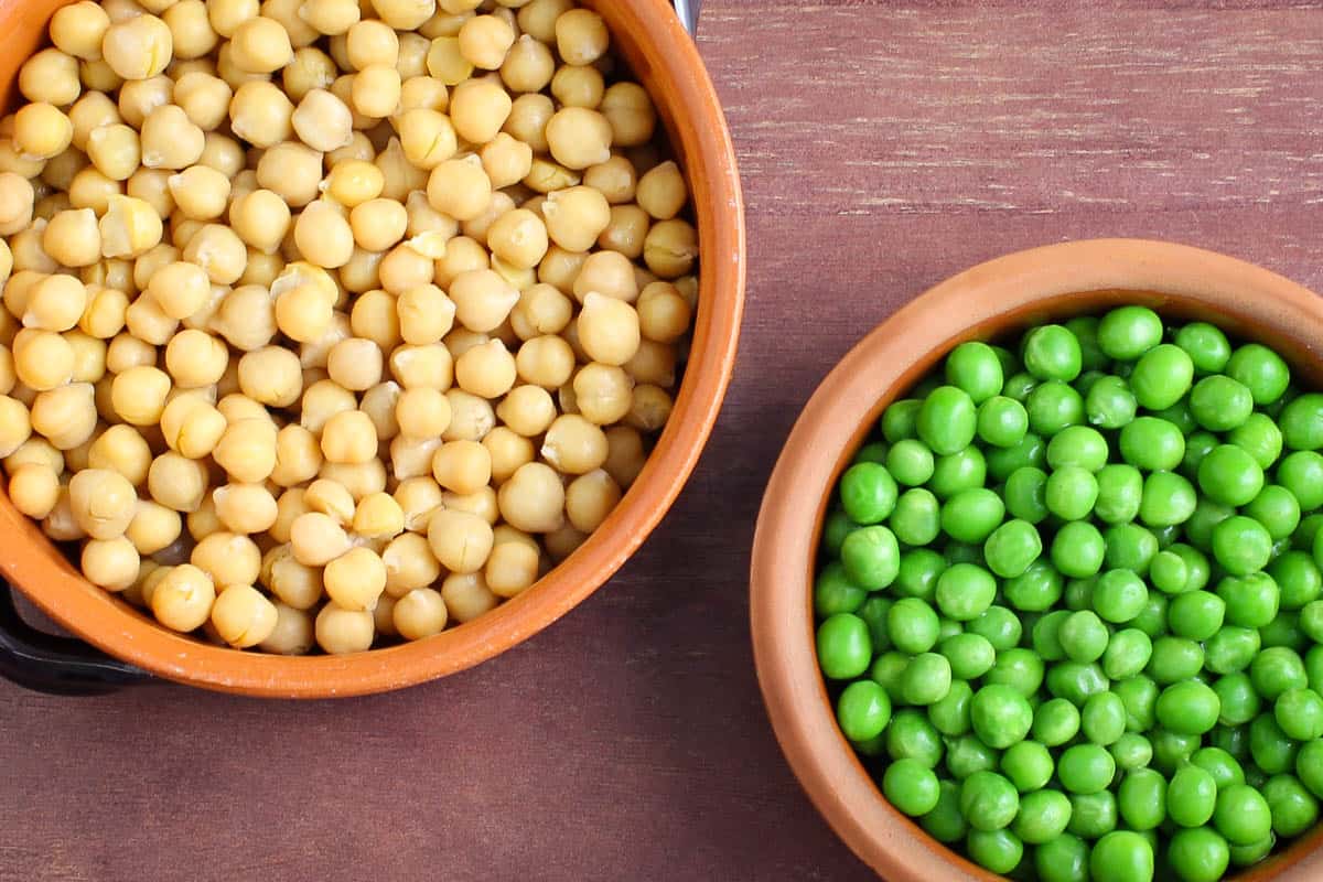 Drained Chickpeas and Frozen Green Peas in Bowls