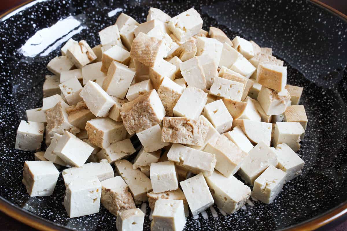 Vegan tofu cubes in bowl.