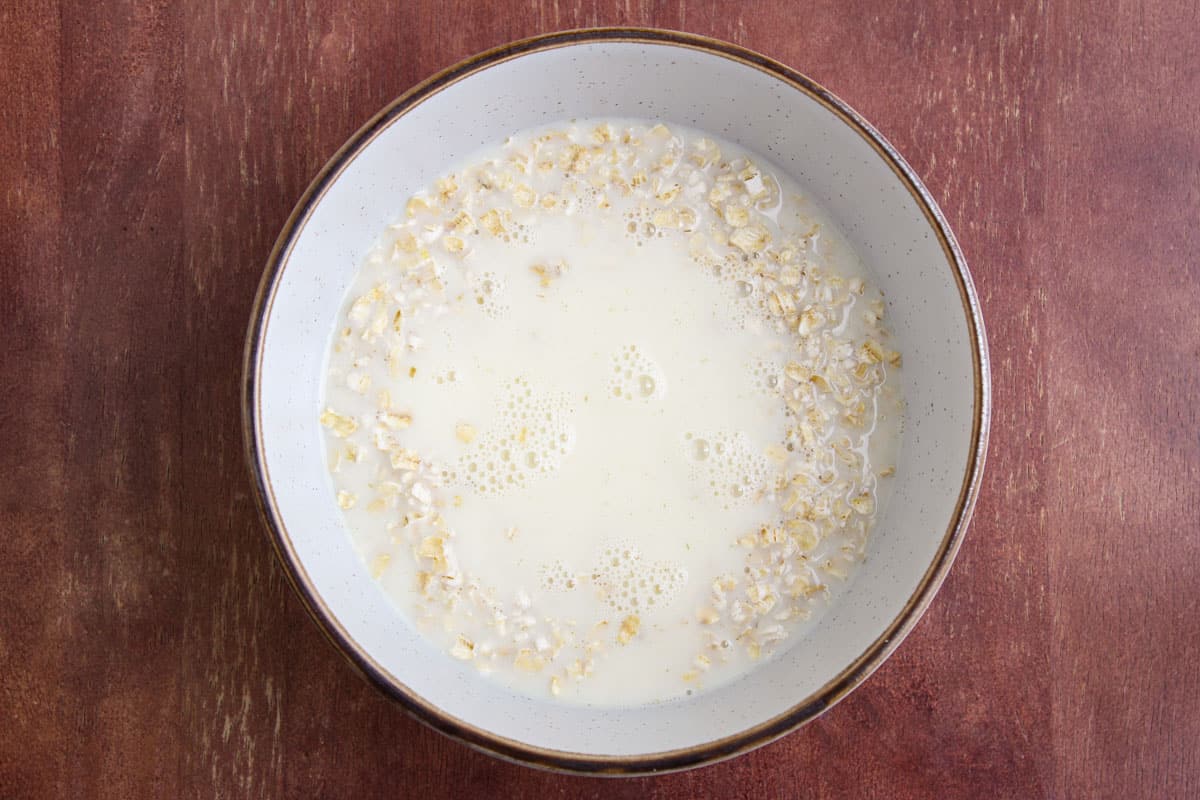 Adding Plant-Based Milk to Oats in Bowl