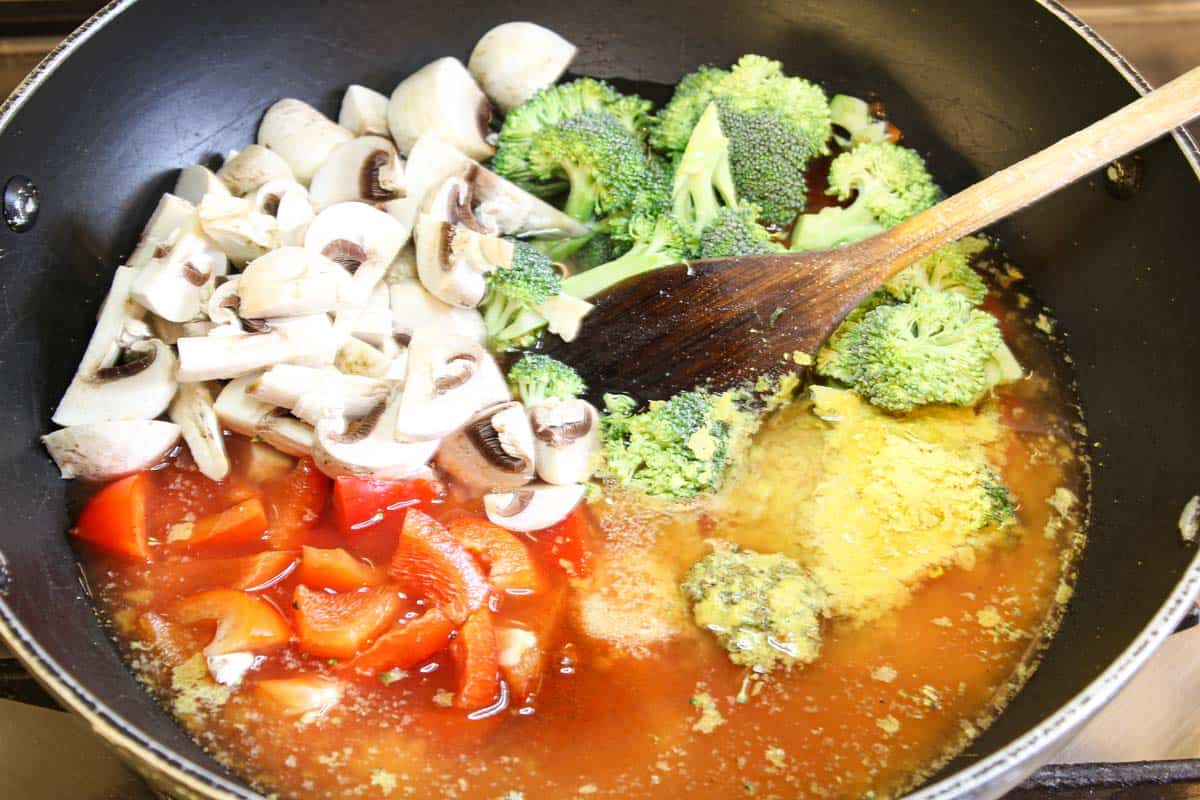 Recipe Process Shot - Adding Uncooked Ingredients to Pan
