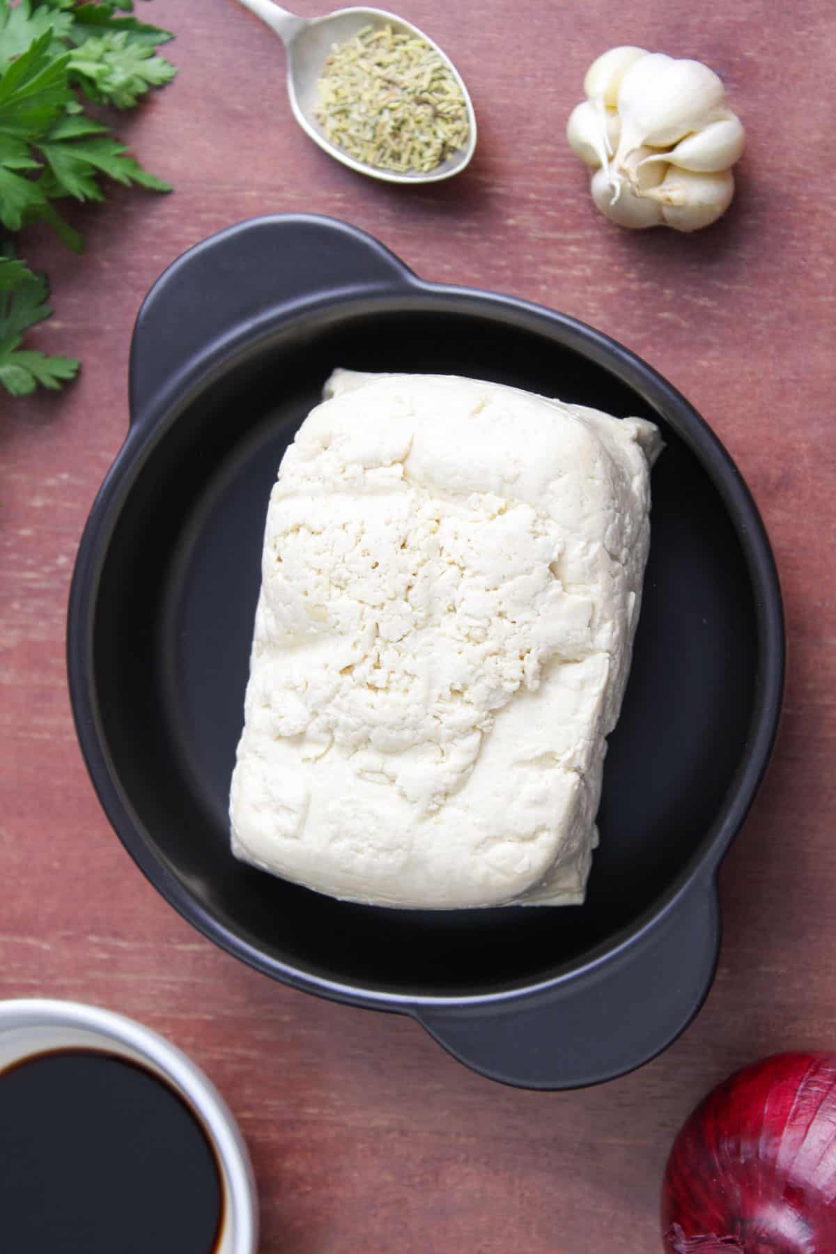 Extra-Firm Tofu Block Pictured with Other Stew Ingredients