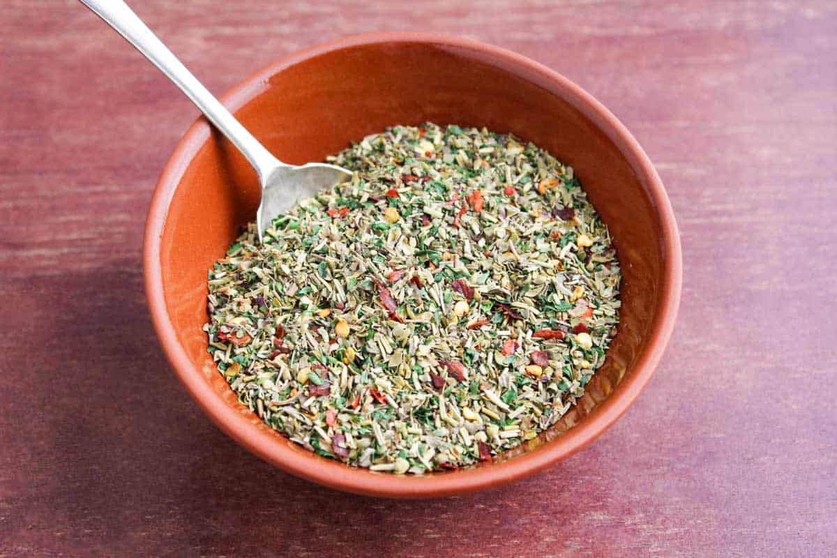 Italian Mixed Herbs in Small Bowl with Spoon