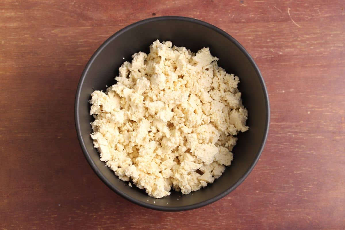 Crumbled tofu pieces in bowl
