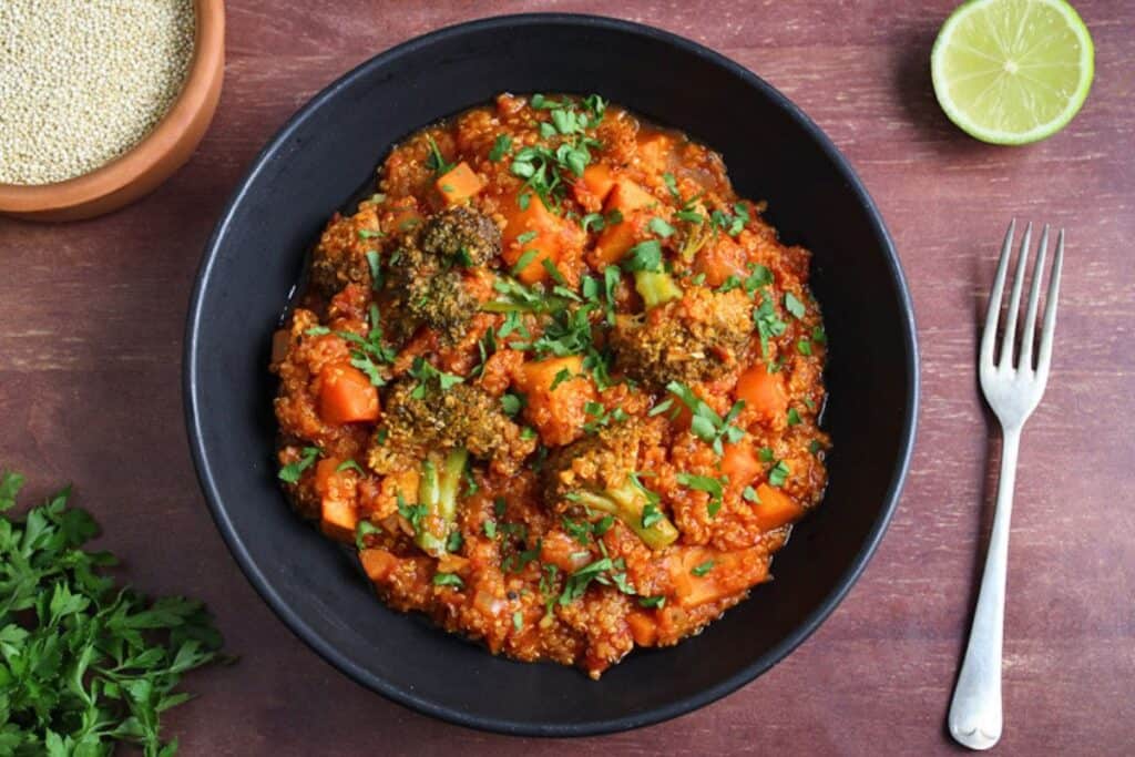 Quinoa and sweet potato stew in bowl overhead